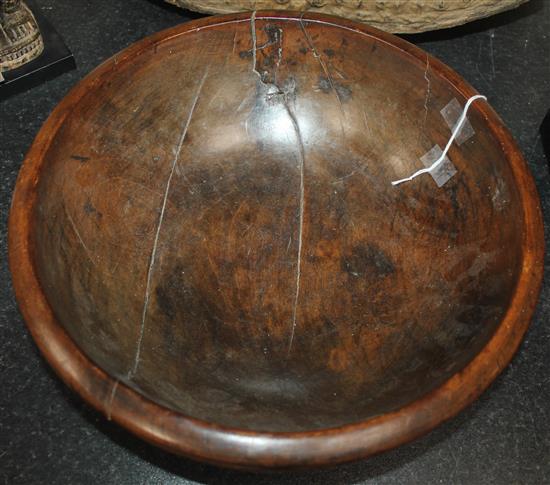 A 19th century turned fruitwood bowl, 14.25in.